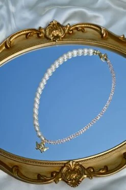 Dippin Daisys Shop 9 Dippin Daisys Shop -Dippin Daisys Shop DDBJCN PNK gold cherub necklace pink 1