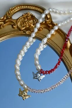 Dreamsbaby Jewels X Dippin Daisys Gold Cherub Necklace 7 Dreamsbaby Jewels X Dippin Daisys Gold Cherub Necklace -Dippin Daisys Shop DDBJCN PNK gold cherub necklace pink 2